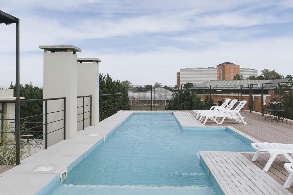 Casa Campus Pilar Suites Екстериор снимка