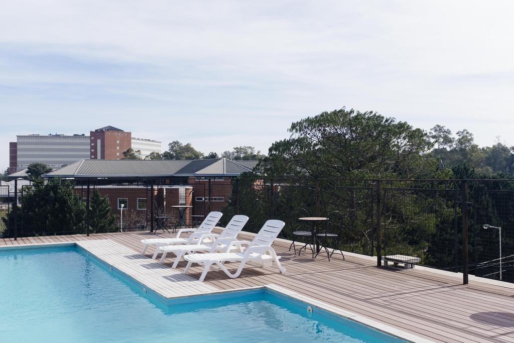 Casa Campus Pilar Suites Екстериор снимка